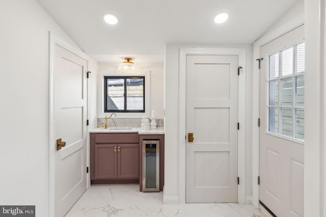 213 Morris St, Philadelphia, PA 19148 - interior space featuring wine cooler, vanity, recessed lighting, and marble finish floor