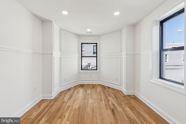 213 Morris St, Philadelphia, PA 19148 - unfurnished room with a healthy amount of sunlight, baseboards, recessed lighting, and light wood-type flooring