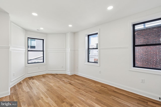 213 Morris St, Philadelphia, PA 19148 - empty room featuring light wood-type flooring, recessed lighting, and a healthy amount of sunlight