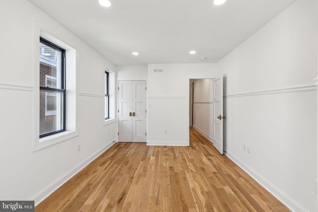 213 Morris St, Philadelphia, PA 19148 - unfurnished bedroom with recessed lighting, visible vents, and light wood-style flooring