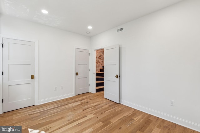 213 Morris St, Philadelphia, PA 19148 - unfurnished bedroom featuring light wood-style floors, baseboards, recessed lighting, and visible vents