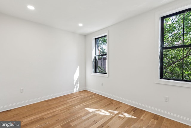 213 Morris St, Philadelphia, PA 19148 - unfurnished room with light wood-style floors, baseboards, and a wealth of natural light