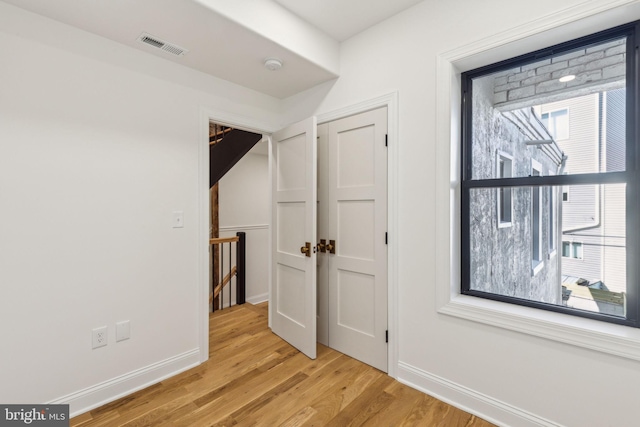 213 Morris St, Philadelphia, PA 19148 - interior space with baseboards, visible vents, and light wood finished floors