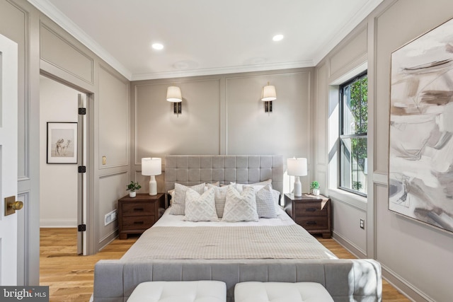 213 Morris St, Philadelphia, PA 19148 - bedroom with crown molding, light wood finished floors, and baseboards