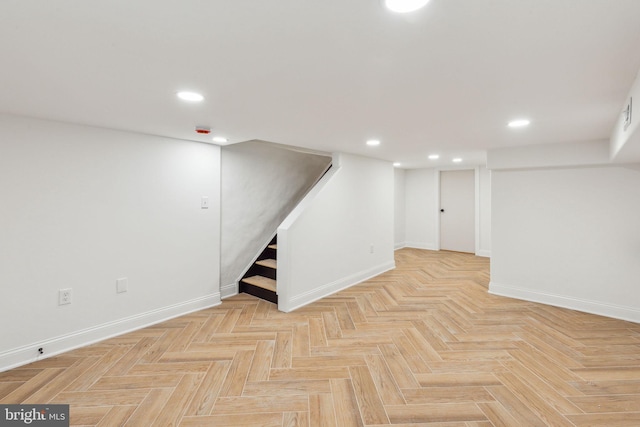 213 Morris St, Philadelphia, PA 19148 - finished below grade area with stairway, baseboards, and recessed lighting
