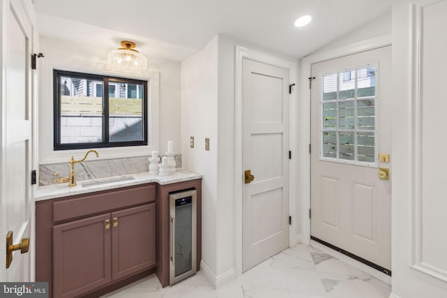 213 Morris St, Philadelphia, PA 19148 - bathroom featuring vanity, beverage cooler, marble finish floor, recessed lighting, and baseboards