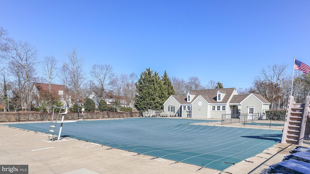 pool featuring fence