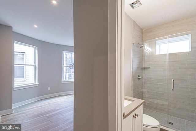5412 Chancellor St, Philadelphia, PA 19139 - full bath featuring vanity, toilet, recessed lighting, wood finished floors, and a stall shower