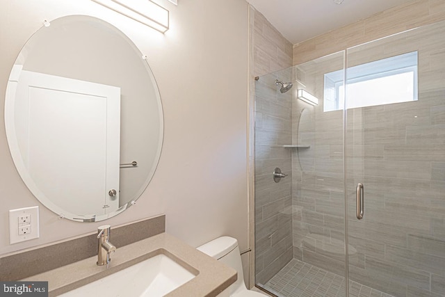 5412 Chancellor St, Philadelphia, PA 19139 - bathroom featuring vanity, a stall shower, and toilet