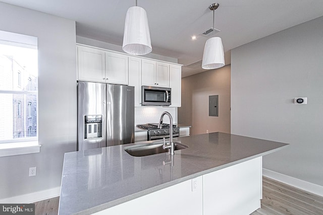 5412 Chancellor St, Philadelphia, PA 19139 - kitchen featuring baseboards, appliances with stainless steel finishes, visible vents, and electric panel