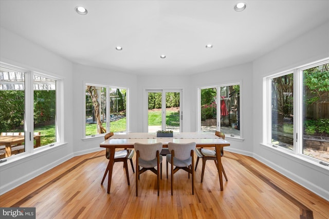 sunroom / solarium featuring plenty of natural light