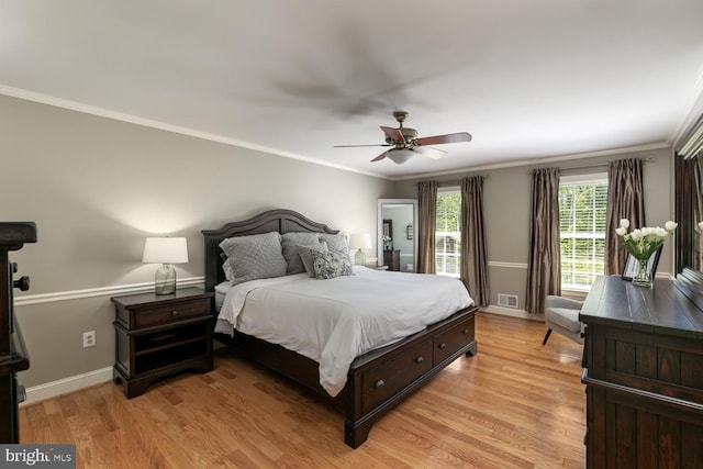 10808 Fieldwood Dr, Fairfax, VA 22030 - bedroom featuring light wood-style floors, ornamental molding, a ceiling fan, and baseboards