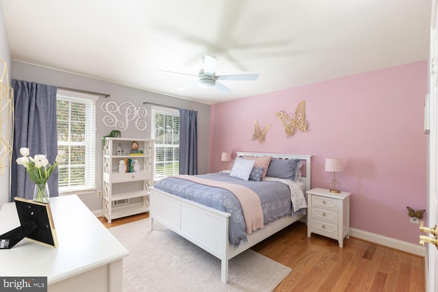 10808 Fieldwood Dr, Fairfax, VA 22030 - bedroom with light wood finished floors, baseboards, and a ceiling fan