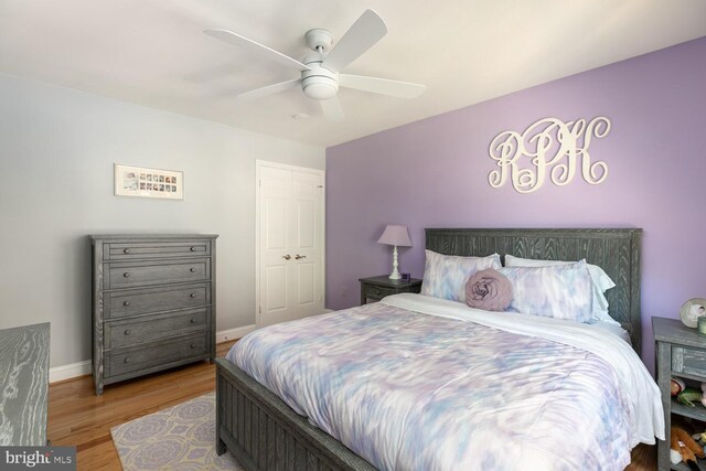 10808 Fieldwood Dr, Fairfax, VA 22030 - bedroom featuring wood finished floors, ceiling fan, and baseboards