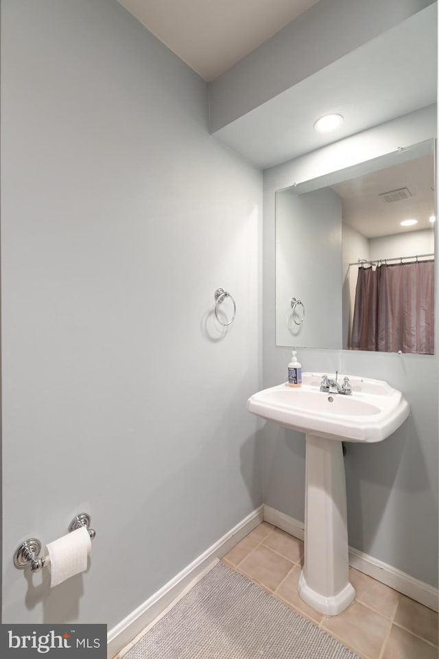 10808 Fieldwood Dr, Fairfax, VA 22030 - bathroom featuring tile patterned flooring and baseboards