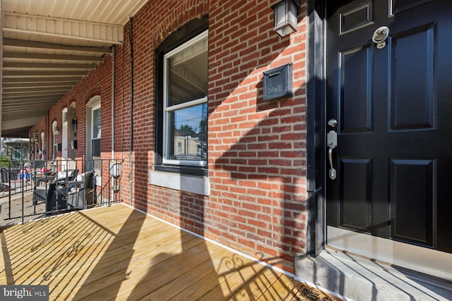 418 Monastery Ave, Philadelphia, PA 19128 - wooden deck featuring covered porch