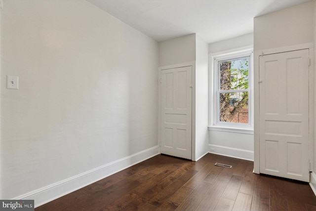 418 Monastery Ave, Philadelphia, PA 19128 - interior space featuring baseboards, dark wood finished floors, and visible vents
