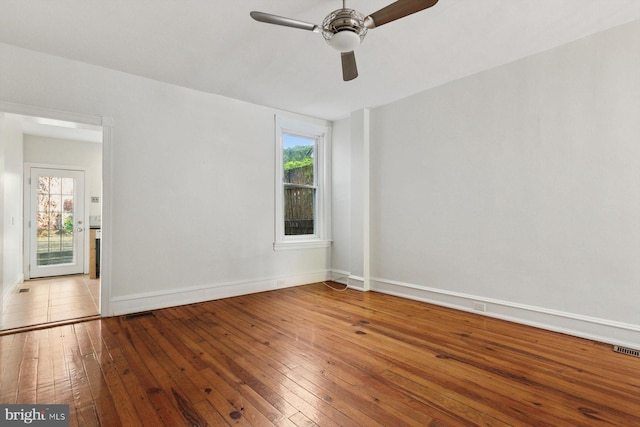 418 Monastery Ave, Philadelphia, PA 19128 - empty room with a ceiling fan, baseboards, plenty of natural light, and hardwood / wood-style flooring