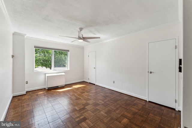 3701 5th St S Unit 212, Arlington, VA 22204 - empty room with ornamental molding, ceiling fan, baseboards, and radiator