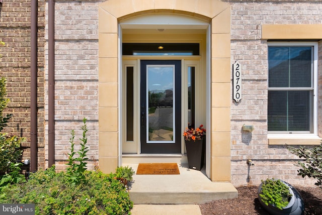 20790 Duxbury Ter, Ashburn, VA 20147 - view of exterior entry featuring brick siding
