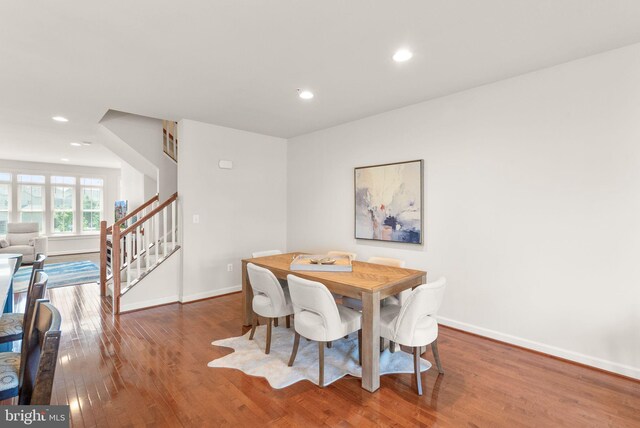 20790 Duxbury Ter, Ashburn, VA 20147 - dining room with stairs, wood finished floors, and recessed lighting