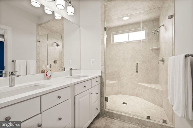 20790 Duxbury Ter, Ashburn, VA 20147 - bathroom featuring double vanity and a shower stall