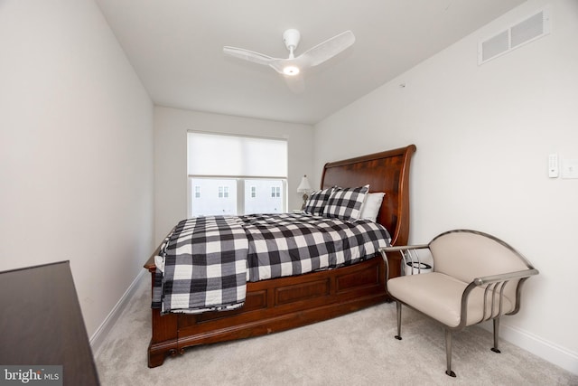 bedroom featuring baseboards, ceiling fan, carpet, and visible vents