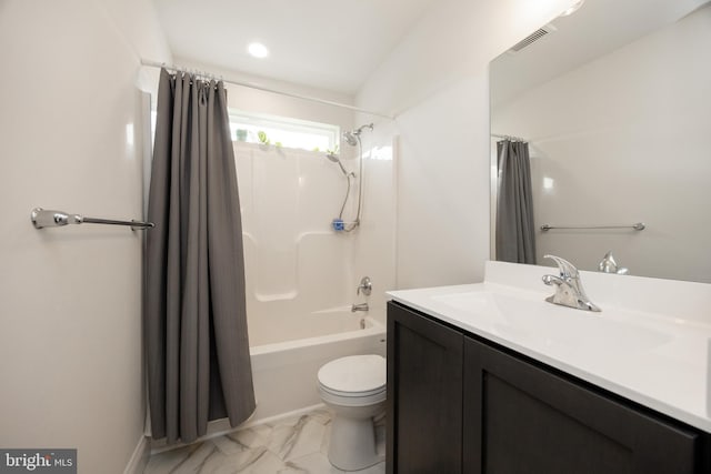 bathroom featuring visible vents, vanity, marble finish floor, shower / bath combination with curtain, and toilet