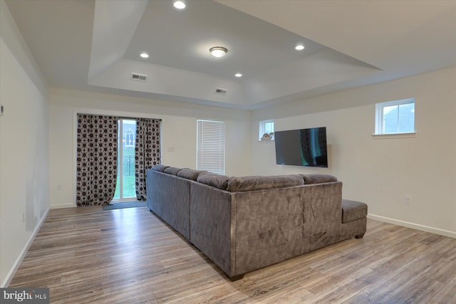 2 Shillington Ln, Carlisle, PA 17013 - living area with a raised ceiling, light wood finished floors, and visible vents