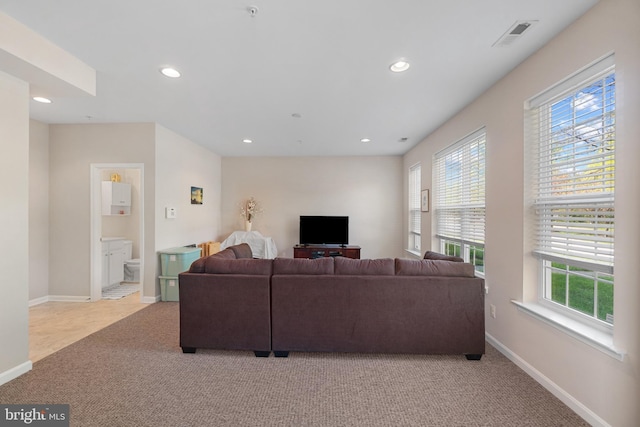 136 Martha Lewis Blvd, Havre De Grace, MD 21078 - living room featuring light colored carpet, recessed lighting, and plenty of natural light