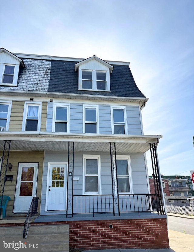 multi unit property featuring covered porch