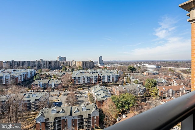 birds eye view of property featuring a city view