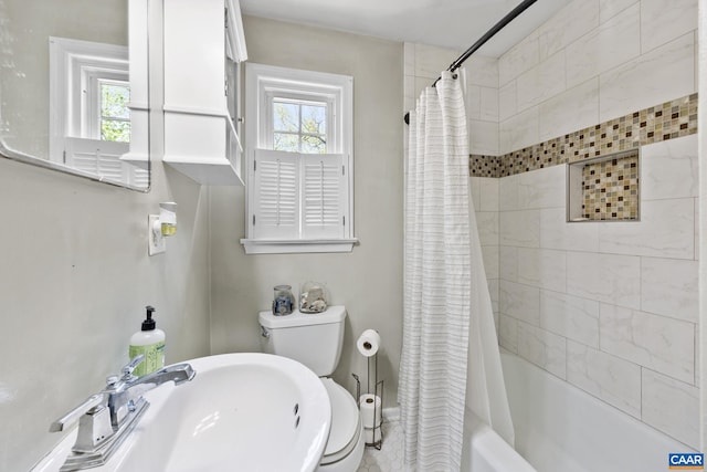 1014 Holmes Ave, Charlottesville, VA 22901 - full bathroom with toilet, shower / bath combination with curtain, a wealth of natural light, and a sink