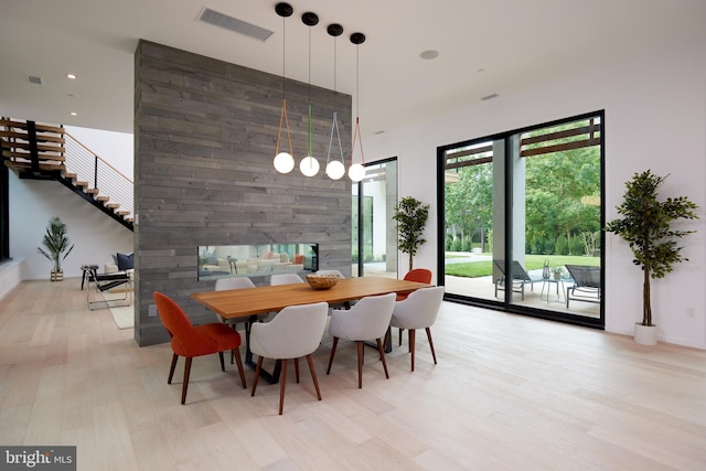 dining space featuring recessed lighting, baseboards, visible vents, and wood finished floors