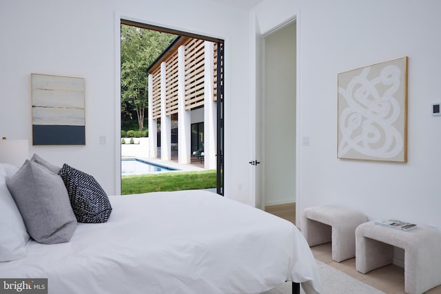 bedroom featuring wood finished floors