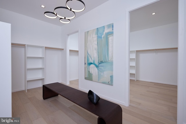 walk in closet featuring light wood-type flooring