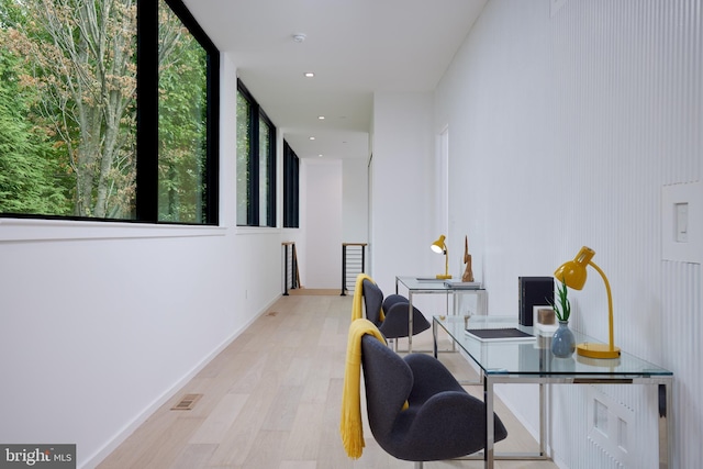 office with recessed lighting, baseboards, wood finished floors, and visible vents