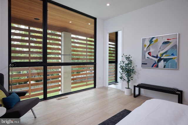 interior space featuring recessed lighting, visible vents, and wood finished floors