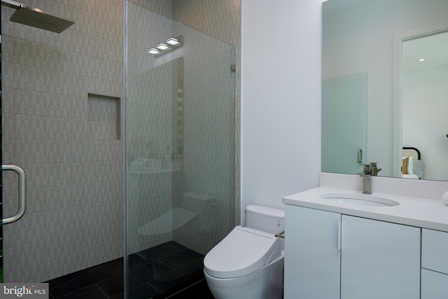 full bath with vanity, a walk in shower, tile patterned flooring, and toilet