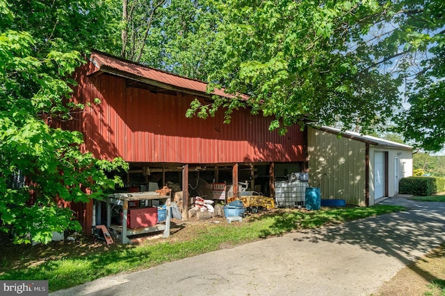 view of outbuilding featuring an outdoor structure