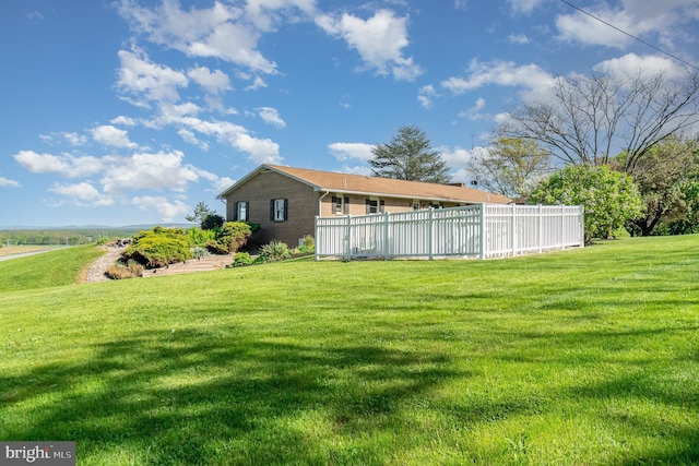 view of yard featuring fence