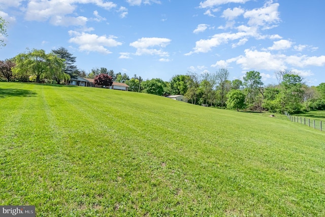 view of yard with fence