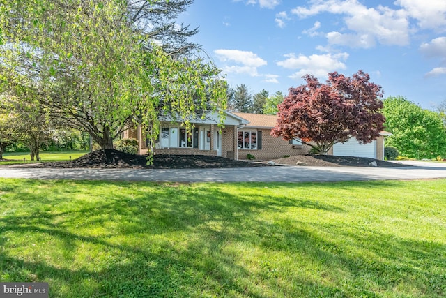view of front of property with a front lawn