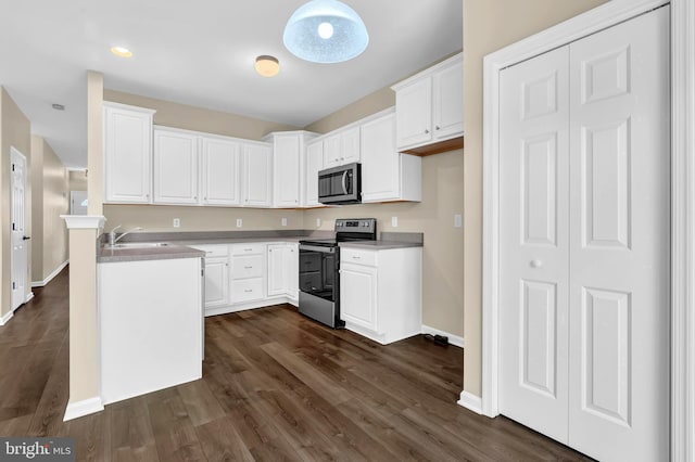 9 Ryan Ct, Telford, PA 18969 - kitchen with baseboards, dark wood-style floors, stainless steel appliances, and a sink