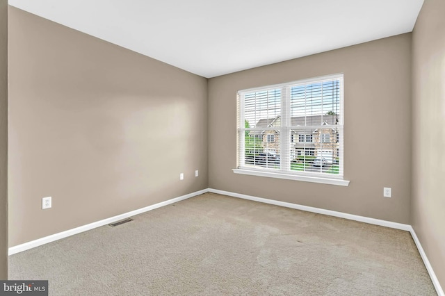 9 Ryan Ct, Telford, PA 18969 - spare room featuring baseboards, visible vents, and carpet
