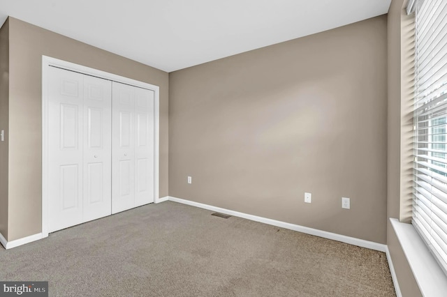 9 Ryan Ct, Telford, PA 18969 - unfurnished bedroom with carpet, baseboards, a closet, and visible vents
