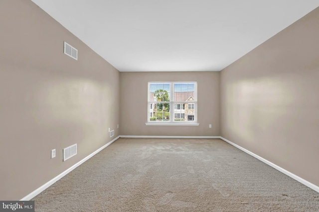 9 Ryan Ct, Telford, PA 18969 - spare room featuring carpet flooring, visible vents, and baseboards
