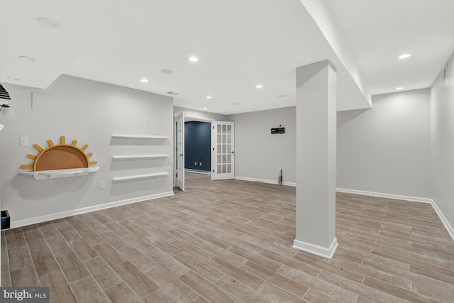 9 Ryan Ct, Telford, PA 18969 - finished below grade area with french doors, wood finished floors, baseboards, and recessed lighting