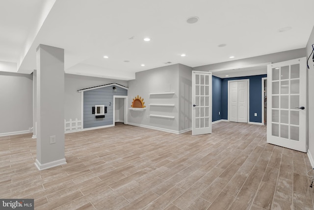 9 Ryan Ct, Telford, PA 18969 - unfurnished living room featuring baseboards, french doors, light wood-style flooring, and recessed lighting