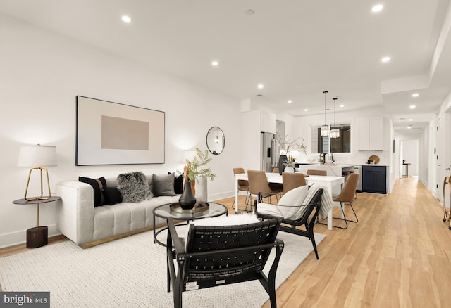 1251 Morse St NE Unit Ph3, Washington, DC 20002 - living room with recessed lighting, light wood finished floors, and baseboards